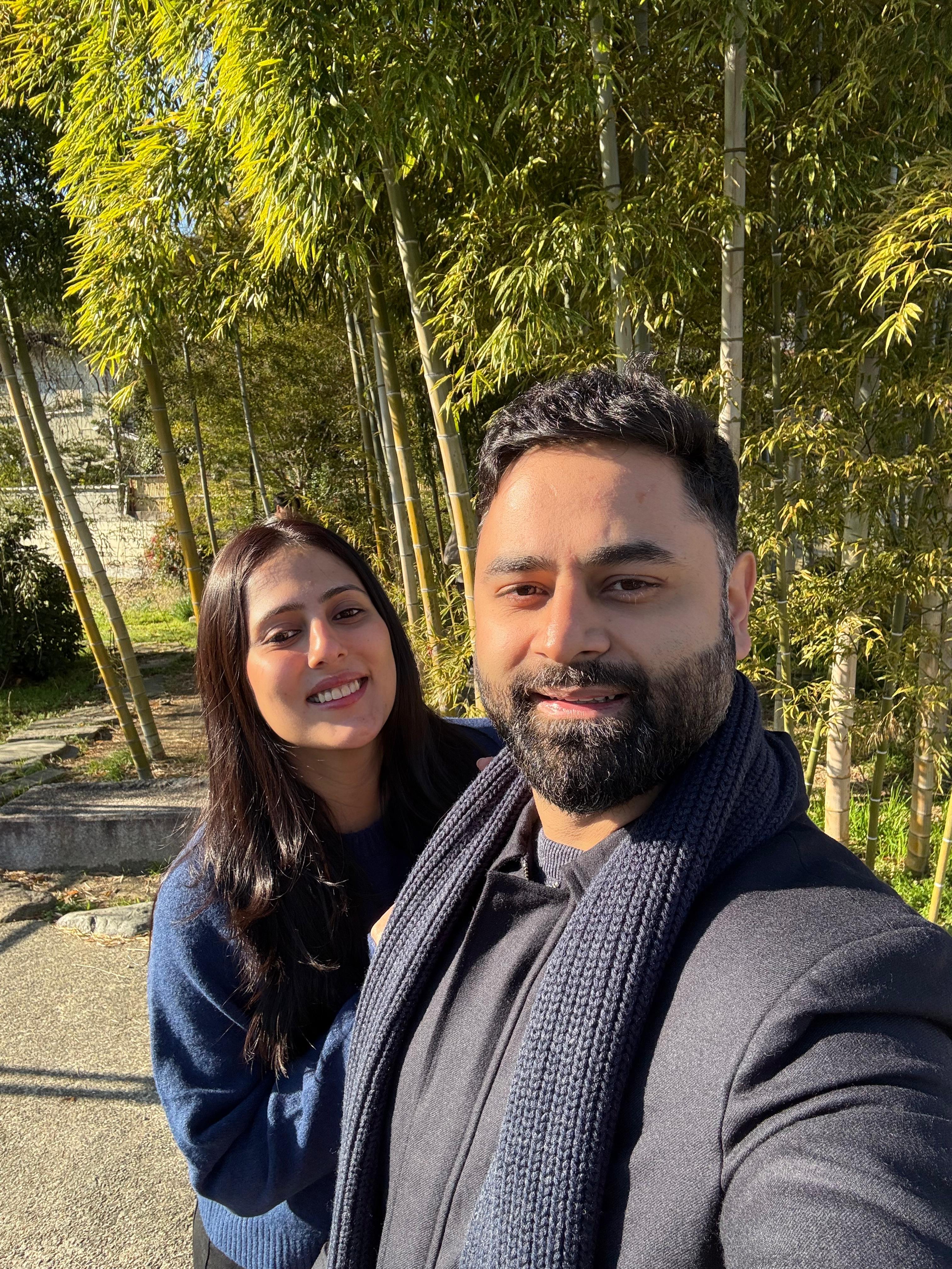 Abhishek and his wife together in a bamboo grove